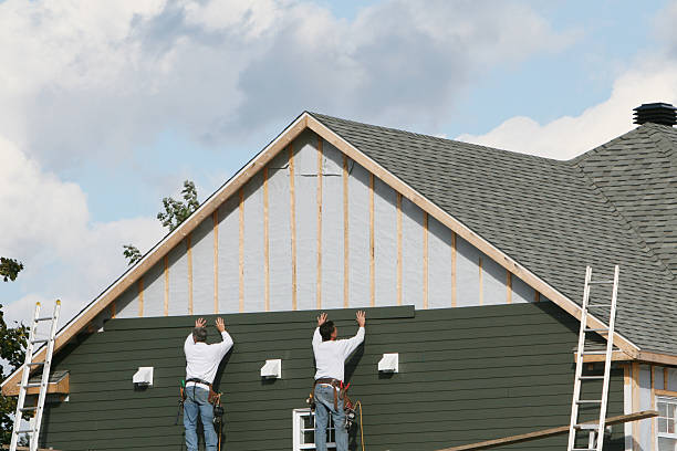 Professional Siding Replacement technician working in Milton, FL